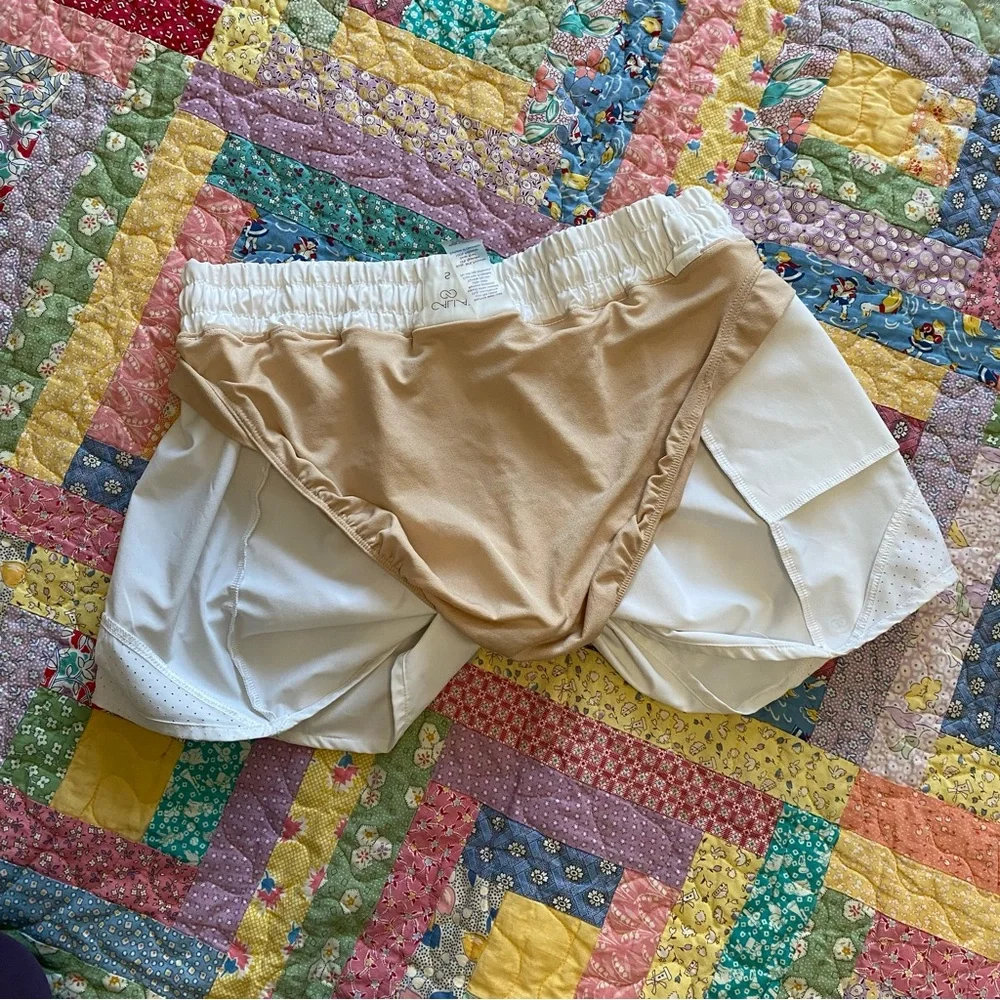 Women’s White Lined Calia Running Shorts - Picture 6 of 6